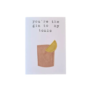 Sustainable greeting card which reads "You're the gin to my tonic" with a slice of lemon in a cup underneath which is made from fabric and has been stitched onto the greeting card. Created from second-hand fabric which has been lovingly eco-dyed in Ōtautahi Christchurch by The Clothworks using local flora from our Garden City.