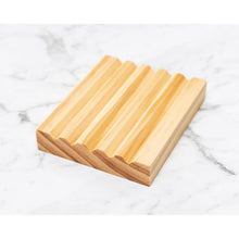 Sustainably sourced Pine wooden soap dish sitting on marble. Handmade in Ōtautahi Christchurch.