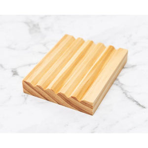 Sustainably sourced Pine wooden soap dish sitting on marble. Handmade in Ōtautahi Christchurch.