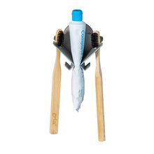 Brush Dock toothbrush holder for 2, holds 2 toothbrushes, a toothpaste tube and two interdental brushes.